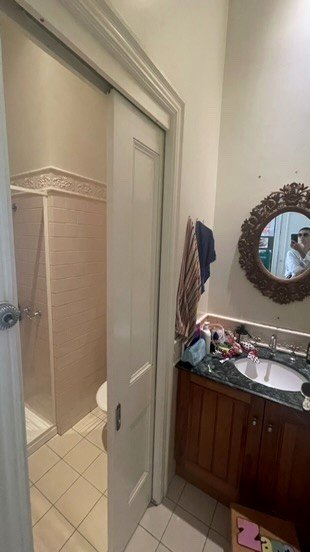 The original powder room before the work
