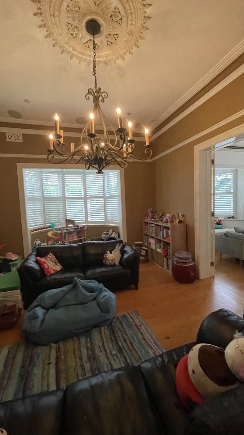 The bay window before the work — the room in its previous life