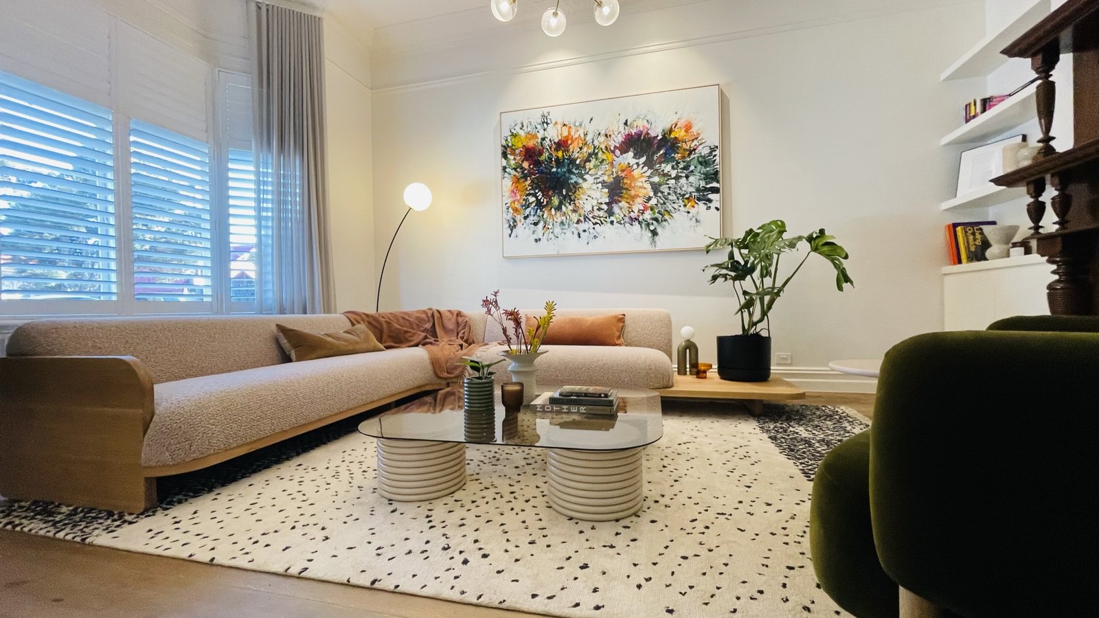 Warrick House — the formal lounge, custom Jardan sofa beneath a commissioned Michael Bond artwork